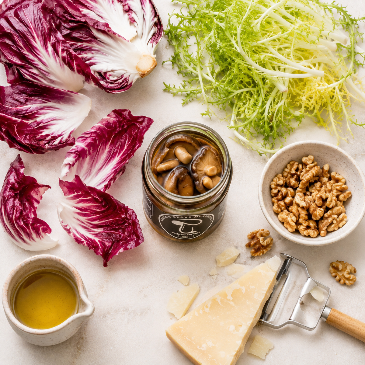 Radicchio, frisée, walnuts, parmesan and a jar of pickled shiitake laid out
